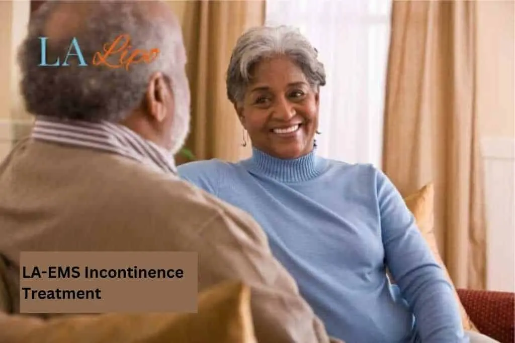 Couple sat smiling at each other - LA-EMS treatment Dover