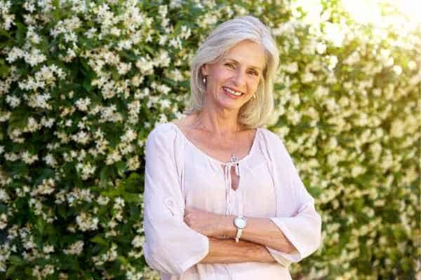Older woman happy with urinary incontinence treatment Dover