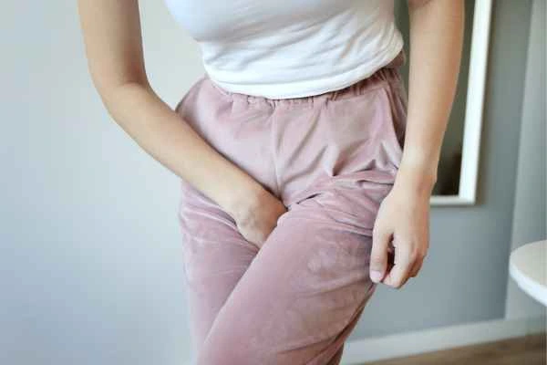 older woman running to the toilet because of urinary incontinence Dover